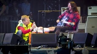 Foo Fighters frontman breaks leg finishes show [upl. by Huan]