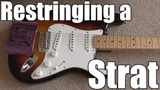 How to Restring a Stratocaster [upl. by Yllac]